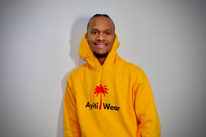 yellow hoodie custom with AyitiWear logo